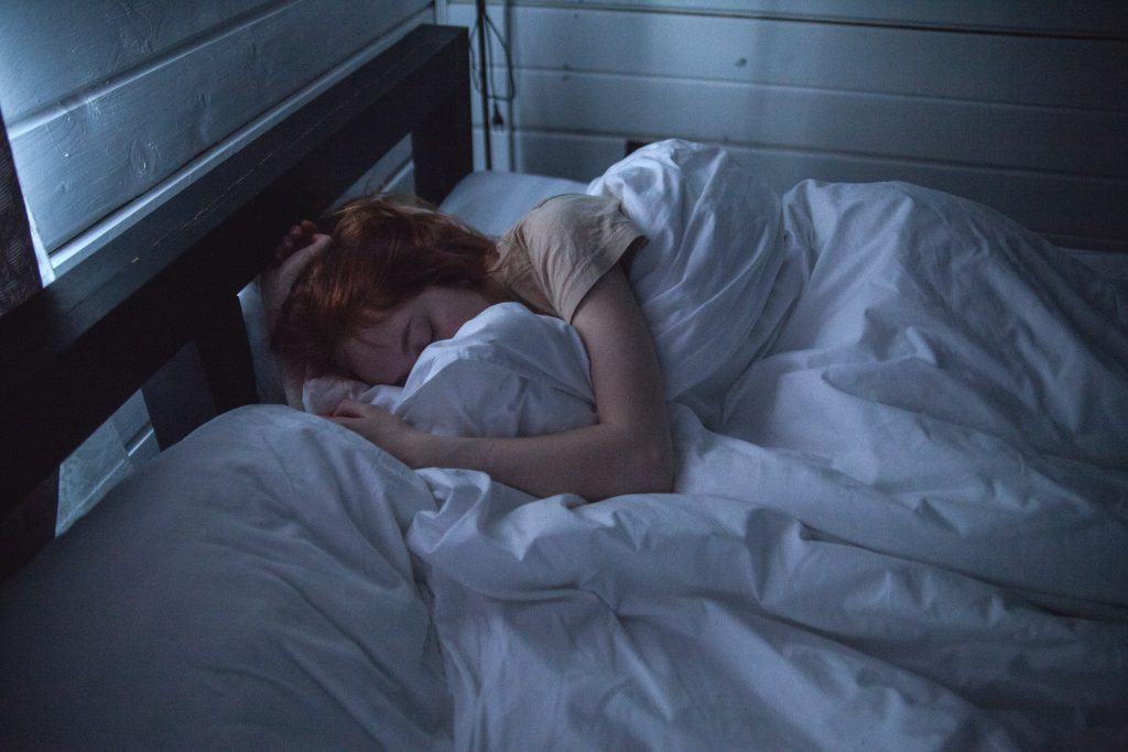 woman sleeping peacefully without insomnia