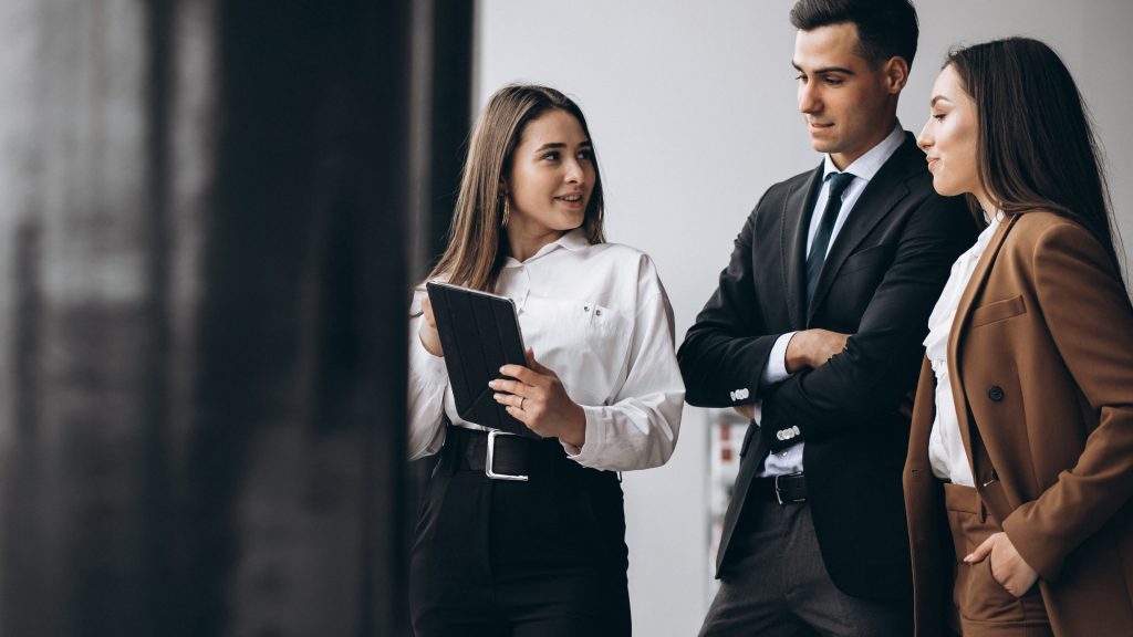 happy corporate employees in office