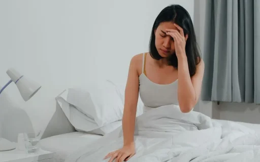asian woman unable to sleep